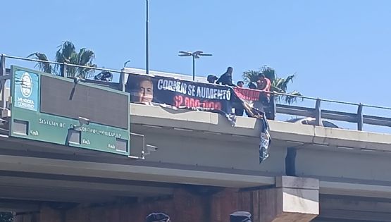 Quisieron detener a judiciales por colgar un cartel contra Alfredo Cornejo