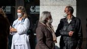 Foto ilustrativa de la nota titulada: Barbijos en todos lados, guardias colapsadas en España por variante de la gripe A