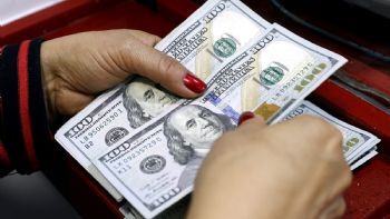 Leve suba: el dólar cerró en $1.465
