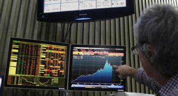 Se dispararon las acciones y bajó el Riesgo País 