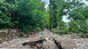 Tras las tormentas, vecinos de Luján aseguran que una calle quedó intransitable