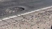 Foto ilustrativa de la nota titulada: Video: un bache peligroso pone en riesgo a motociclistas a la altura de Fray Luis Beltrán